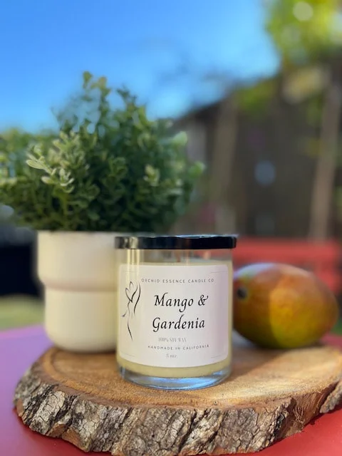 Orchid Essence Candle Company - Photo of the Mango and Gardenia 8 Oz 100% Soy Wax Candle.
